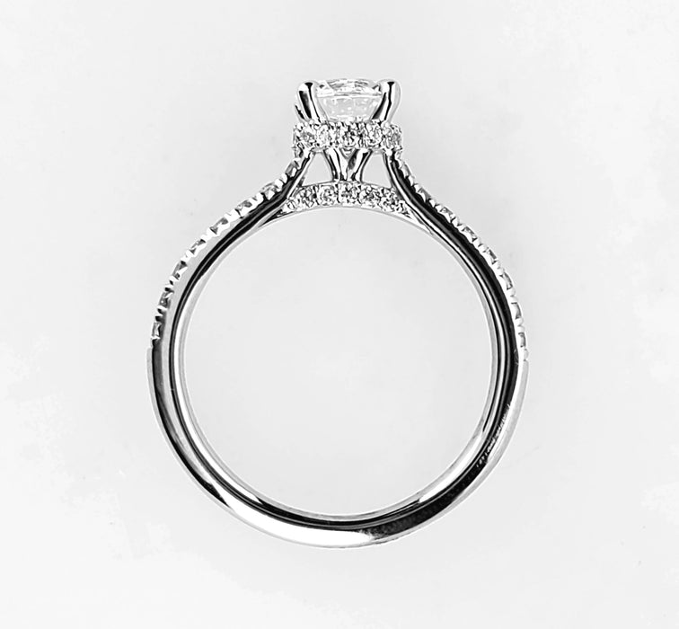 Four claw diamond shank and collar engagement ring set with no less than 0.29 carats.