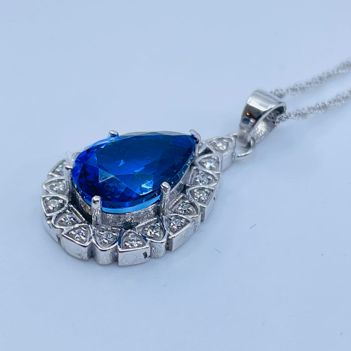 14kt White Gold 2.55ctw Pear shaped Tanzanite and .10ctw diamond Pendant