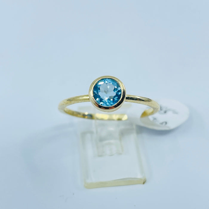 10ky Yellow Gold Blue Topaz bezel set ring