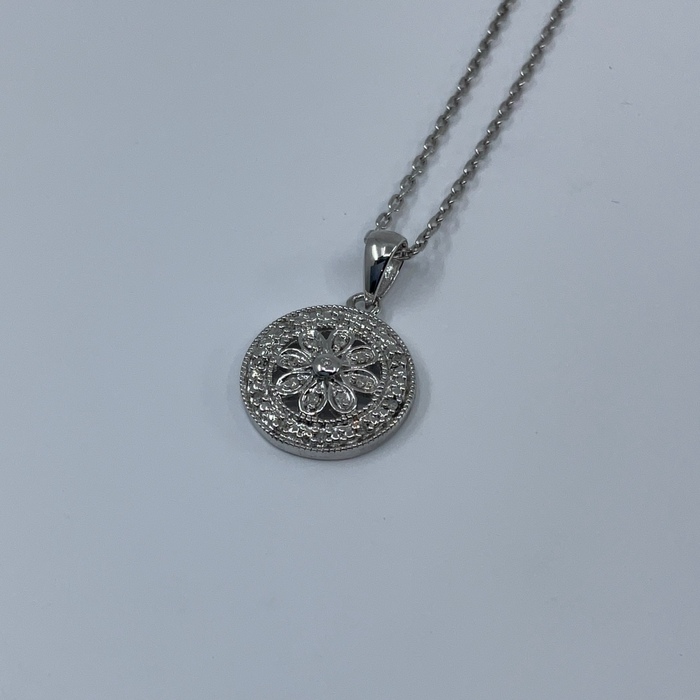 Sterling silver .07ctw diamond pendant