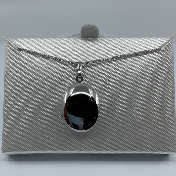 Rhodium finish oval locket