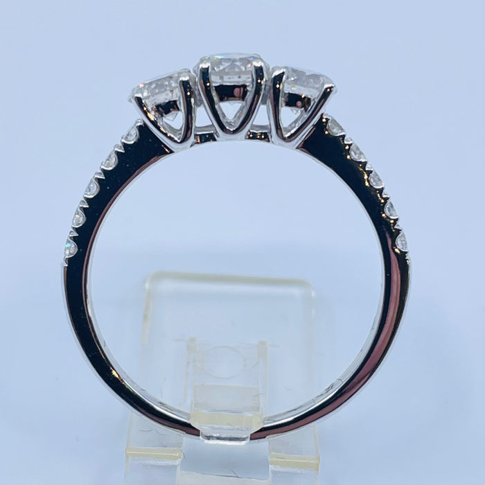 14kt White Gold Three stone ring with side diamonds