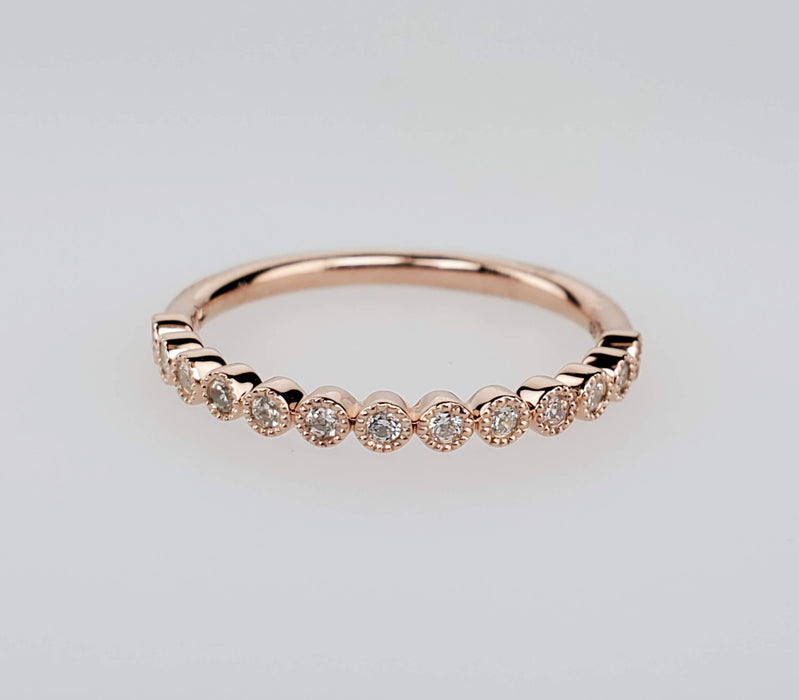 Bezel set millgrain Diamond Band. .16ctw