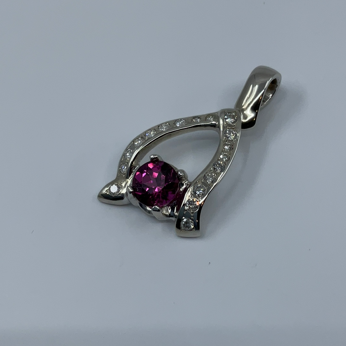 14kt White Gold 1.19ct Rhodolite Garnet and diamond pendant