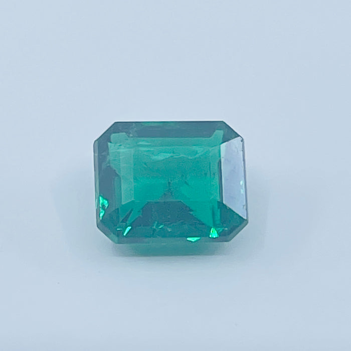 1.53ct  7.4 x 6.31mm Emerald set into a 14kt yellow gold mounting