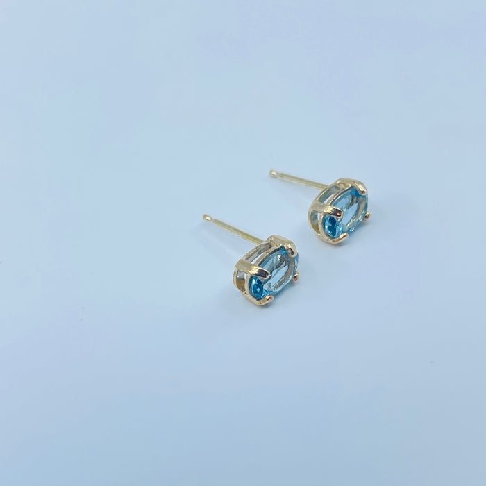 14kt Yellow Gold oval Blue Topaz earrings