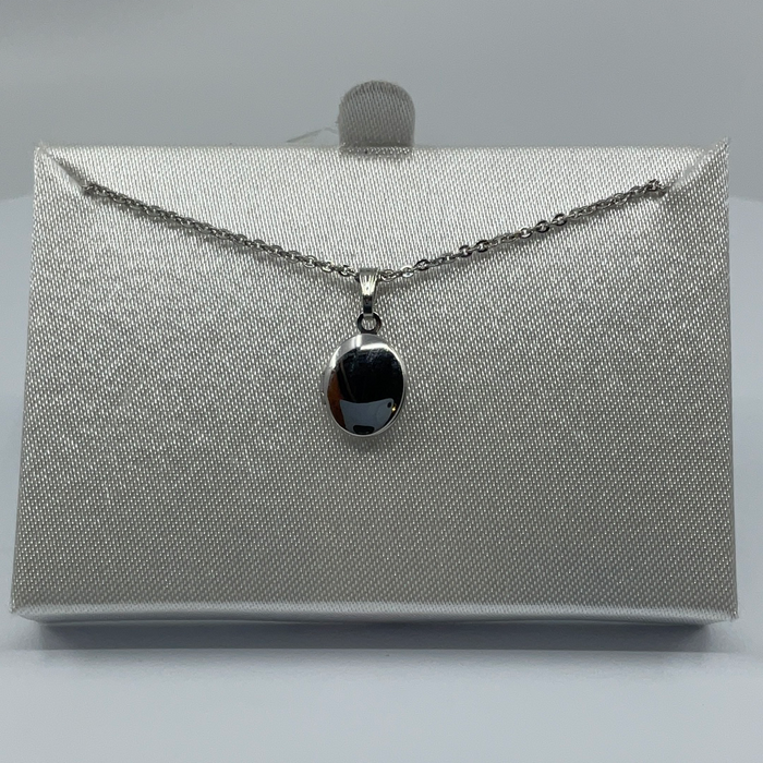 Small Rhodium plated locket