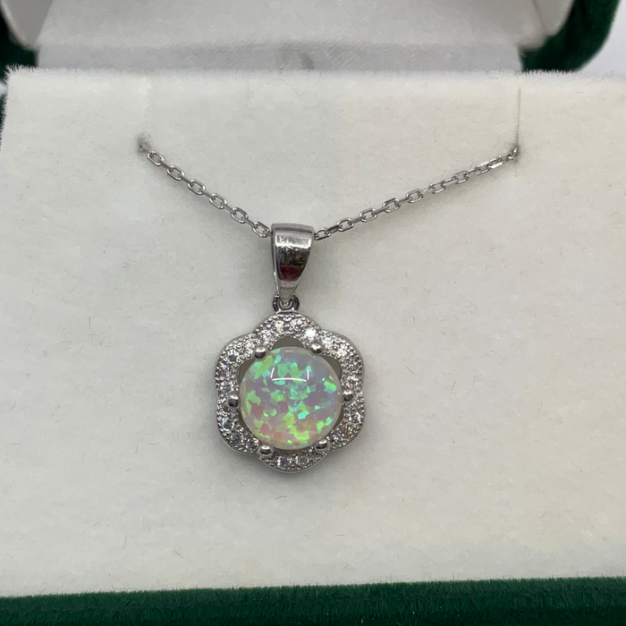 Sterling silver round Opal with CZ flower border pendant