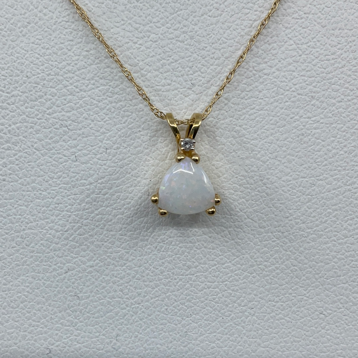 14kt Yellow gold trillion shaped Opal and diamond pendant