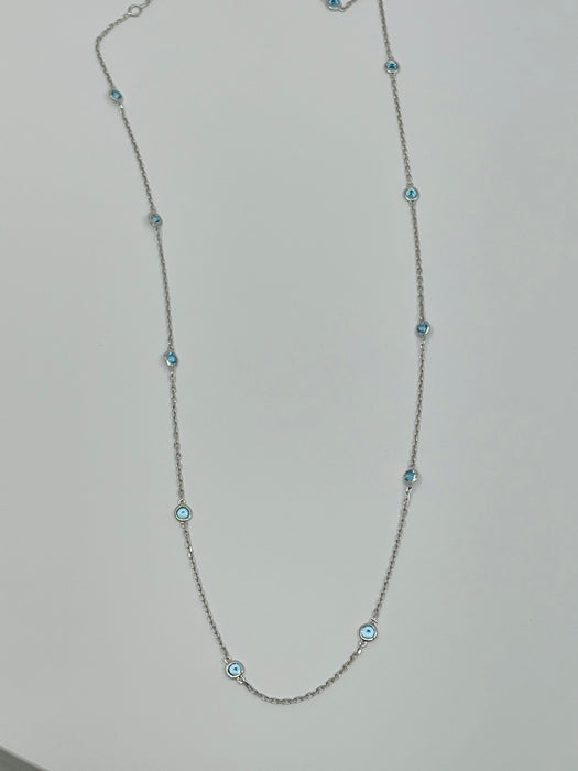 Sterling Silver 18”,  7 Blue Topaz bezel set Necklace