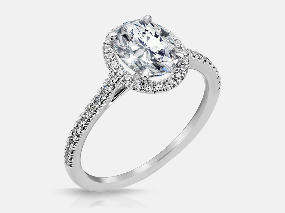 Delicate oval shaped halo Engagement mounting with 44 diamonds in shank for 8x6mm Oval Mounting