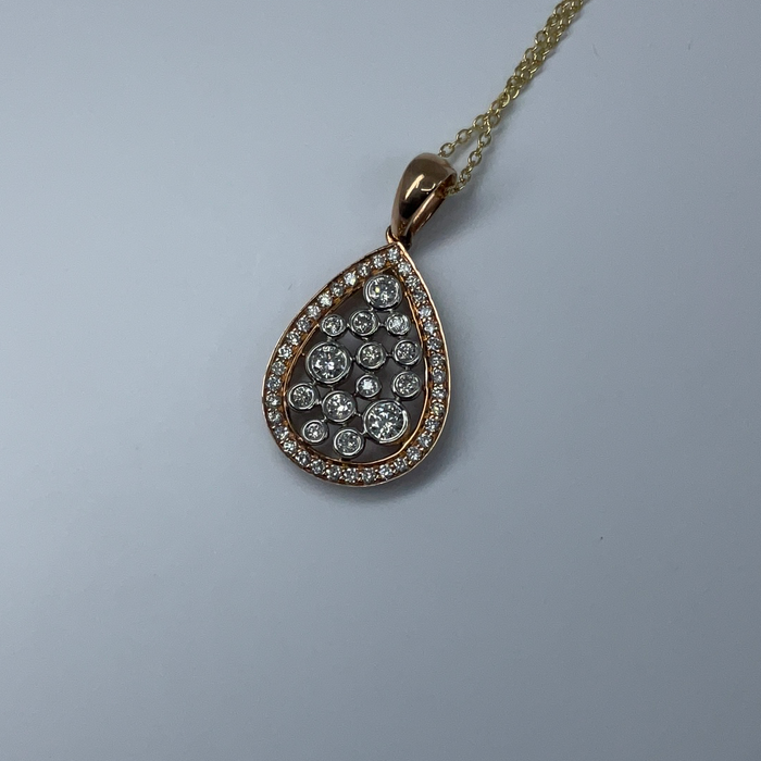 10kt Rose and White Gold .50ctw diamond pendant