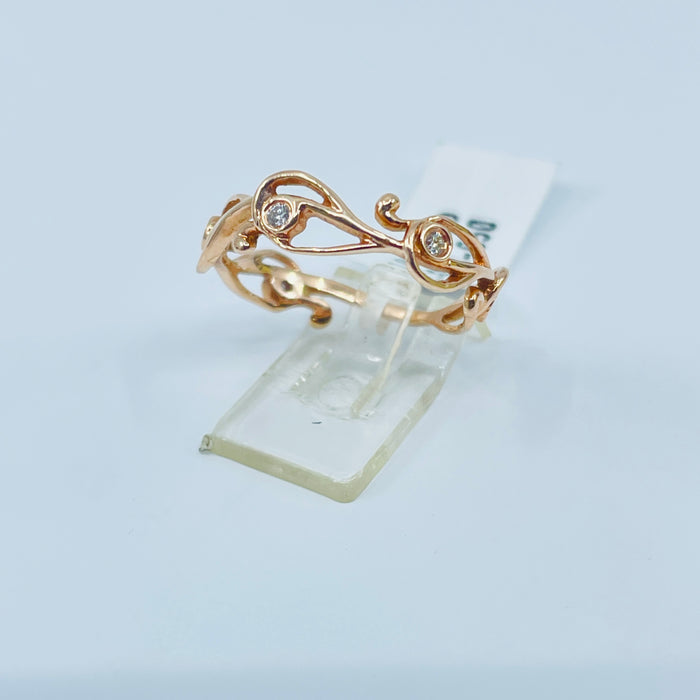 14kt Rose Gold 5 diamond floral band .14ctw