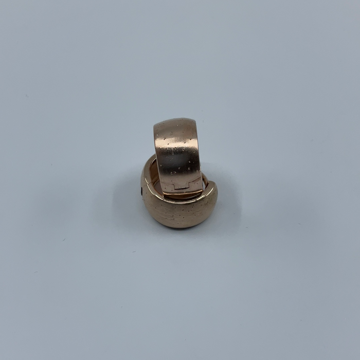 Sterling silver rose tone huggie earrings